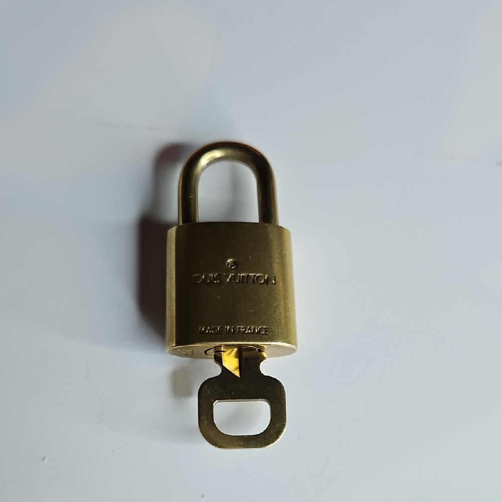 Louis Vuitton Gold Key Holder